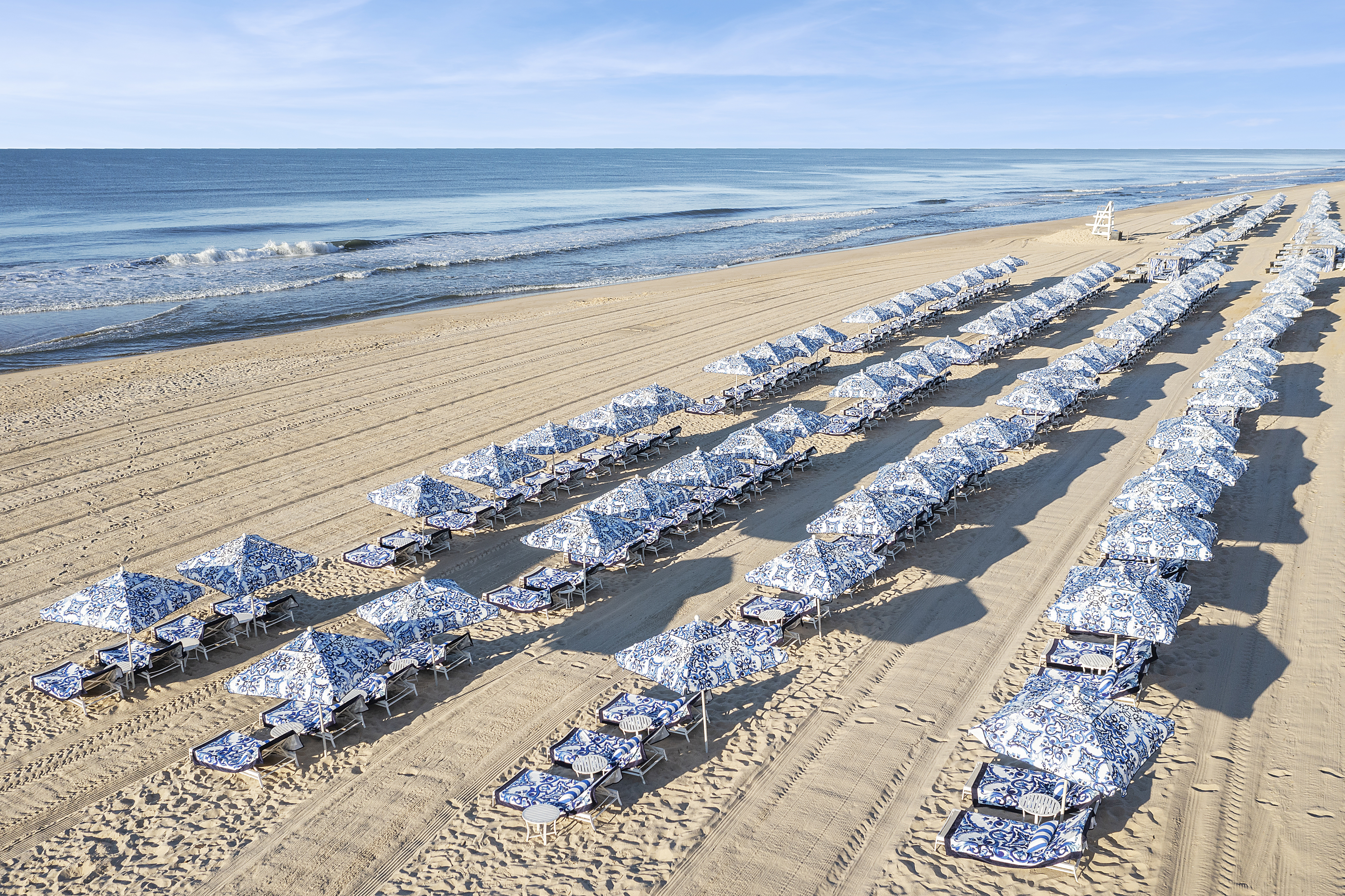 Gurneys Blue and White Beach Chairs and Umbrellas