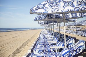 Private Beach D&G branded umbrellas and chairs