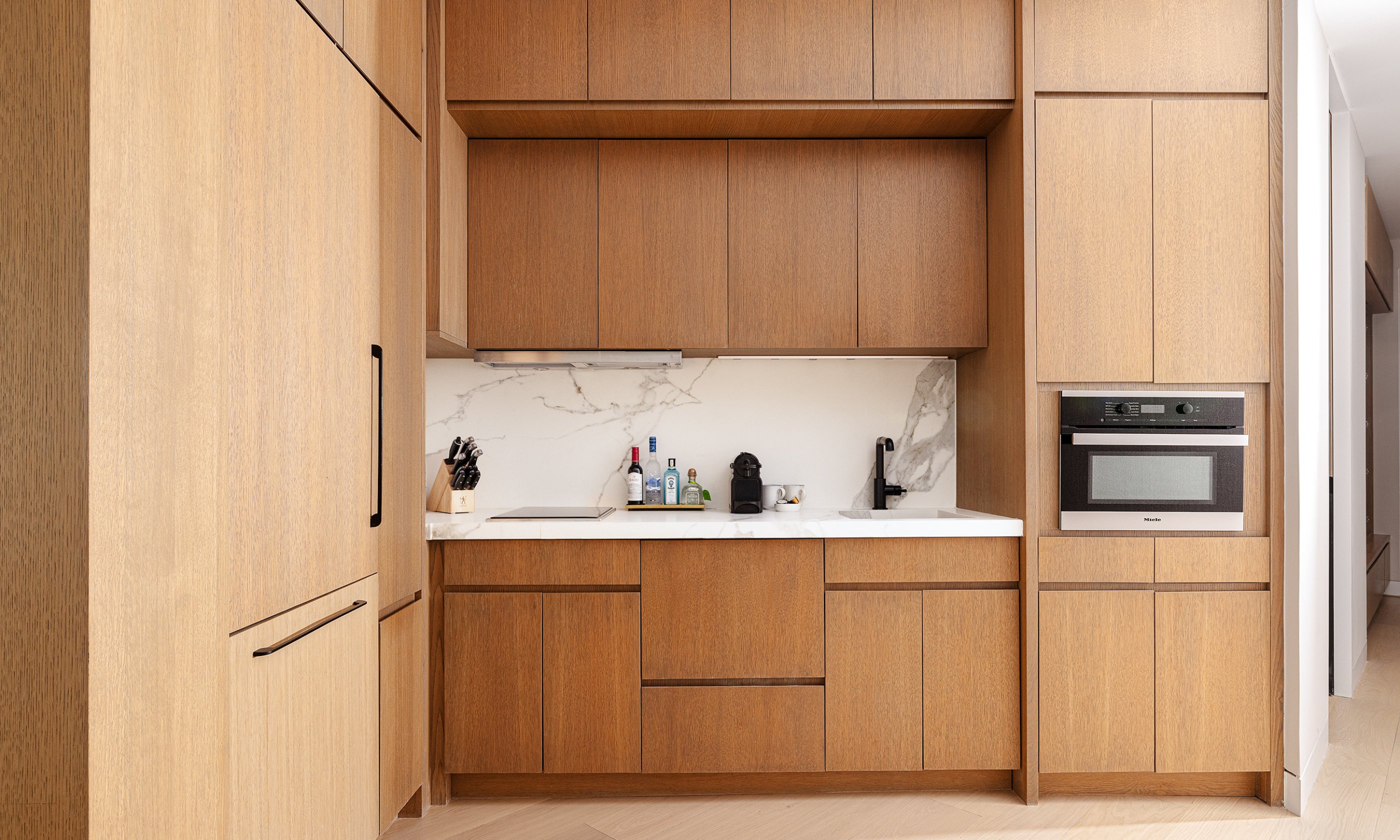 The kitchen in the Ocean View One Bedroom Residence at Gurney's Montauk Resort