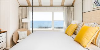 bedroom with yellow pillows 