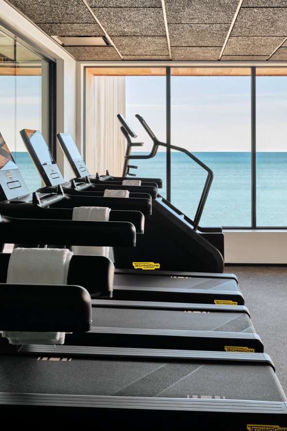 Fitness center with treadmills and stair climber.